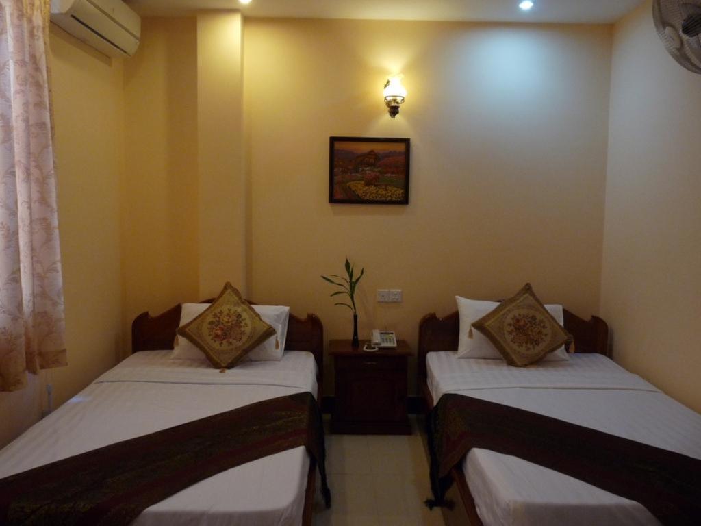 Hotel Hi Land Phnom Penh Zimmer foto